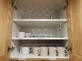 10. Upper left: wine glass for white wine, upper middle: for red wine, upper right: beer mug. Middle left: coffee mugs, middle middle and right: glasses. Bottom left: white mugs, botton right: beige mugs.